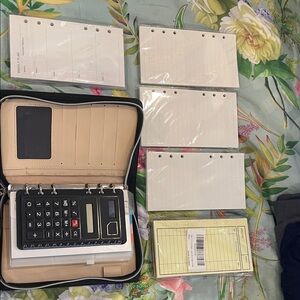 Weekly Planner/Wallet/Budget keeper/Calculator and Extra Pages